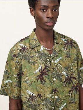 AllSaints green tropical palm print short-sleeve camp shirt with a relaxed fit